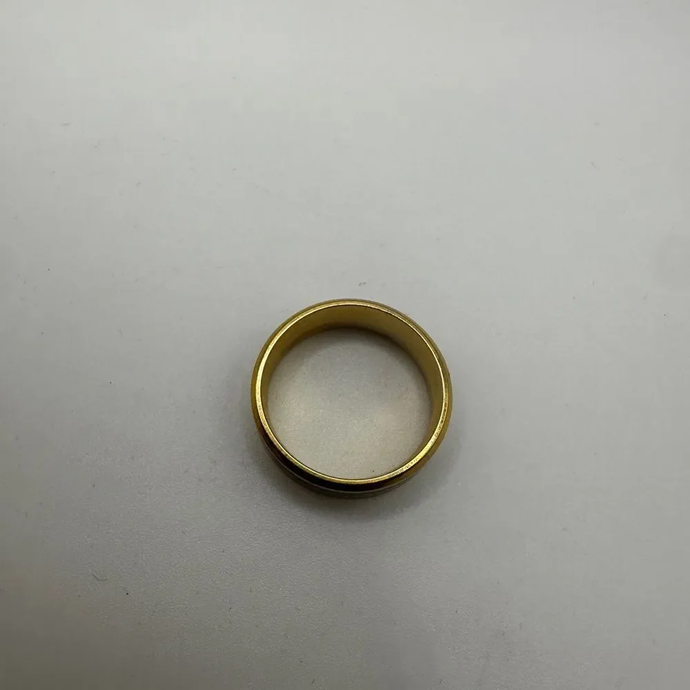 Men's size 12.5 yellow gold tone with black center/silver scroll work, ring!‎